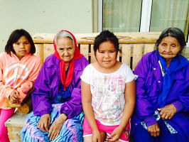 Northern community elders with children